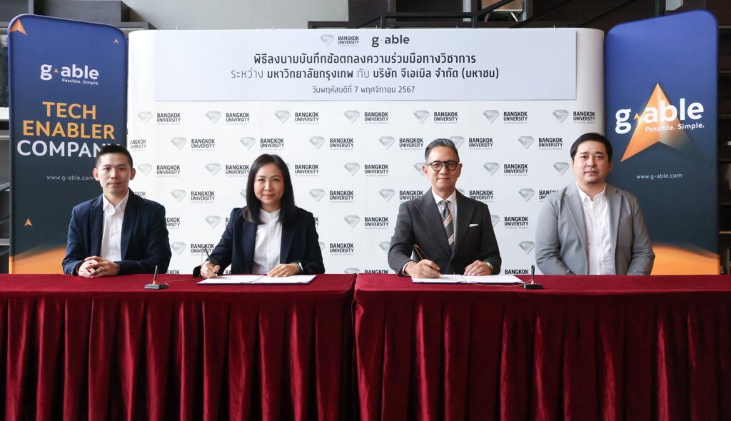 G-Able, a Tech Enabler leading technology company, and Bangkok University have signed a Memorandum of Understanding (MOU) to collaborate on developing a highly skilled workforce for the technology industry. The agreement was signed by Ms. Thitikarn Krisanaviparkporn, Senior Executive Vice President of Human Resources at G-Able, and Asst. Prof. Sansern Milindasuta, Executive Vice President for Academic Affairs at Bangkok University, on November 7, 2024.